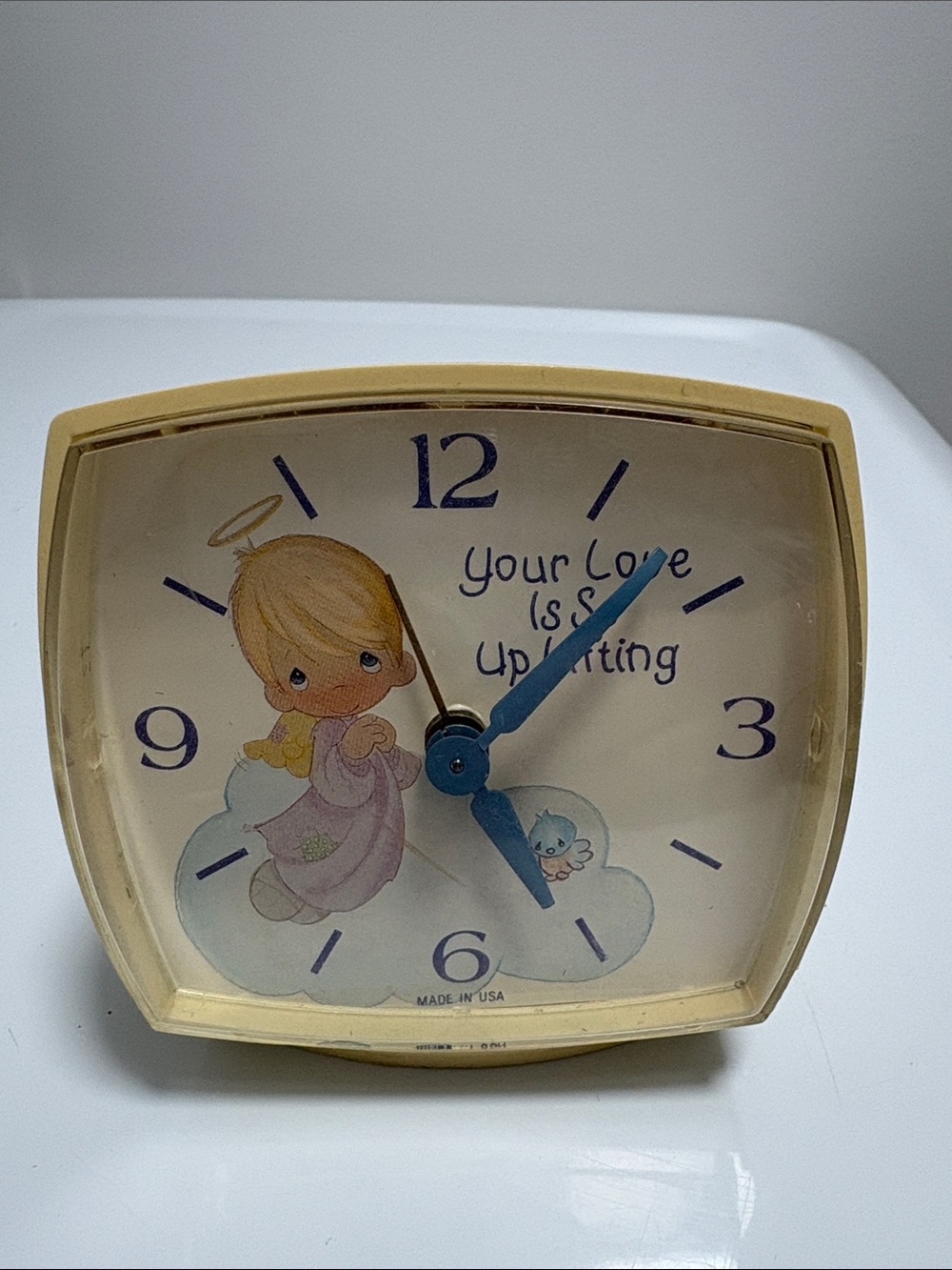 Cream Angel Illustration Wind up Clock with Blue Hands works